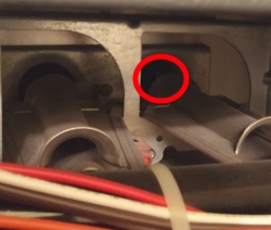 Thermocouple behind furnace burners