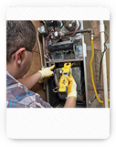 Technician repairing a furnace